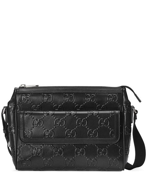 gucci embossed messenger bag